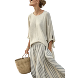 אורסין | חולצה קלילה וחצאית מידי מפוספסת