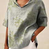 אנדראה | טופ אלגנטי עם צווארון V