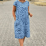 Dorothee - שמלת כותנה רכה עם כיסים בצדדים